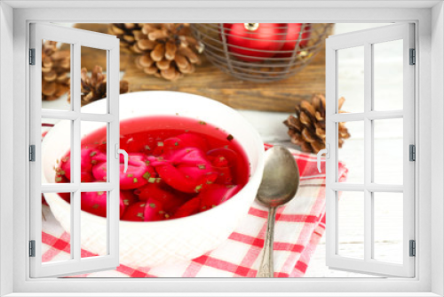 Fototapeta Naklejka Na Ścianę Okno 3D - Traditional polish clear red borscht with dumplings in bowl