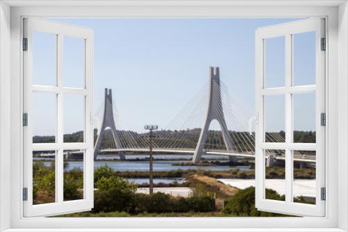 Fototapeta Naklejka Na Ścianę Okno 3D - View of the iconic bridge over Portimao's Arade river.