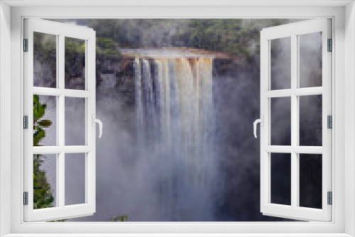 Fototapeta Naklejka Na Ścianę Okno 3D - Kayetur Waterfall with a stormy stream of water and steep banks on a clear sunny day in the middle of the jungle, Guyana. Subtropics, world tourism.
