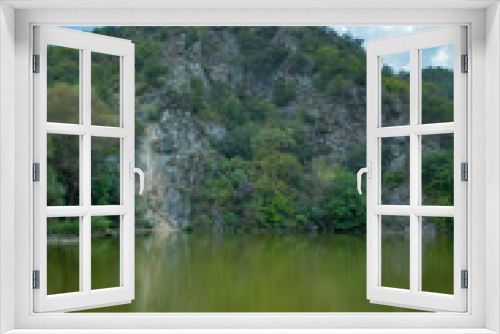Fototapeta Naklejka Na Ścianę Okno 3D - Beautiful view. Green lake with a forest