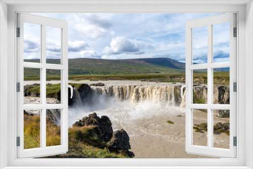 Fototapeta Naklejka Na Ścianę Okno 3D - Panoramic view from the Eastern bank of the Godafoss waterfall in Iceland which runs through the Bardardalur valley