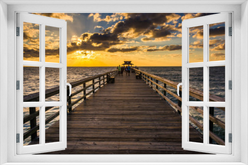 Fototapeta Naklejka Na Ścianę Okno 3D - Sunset over the fishing pier in Naples, Florida.