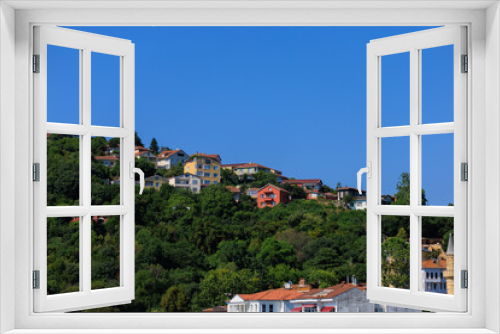 Fototapeta Naklejka Na Ścianę Okno 3D - View of buildings and houses in public places in Turkey, sunny summer day