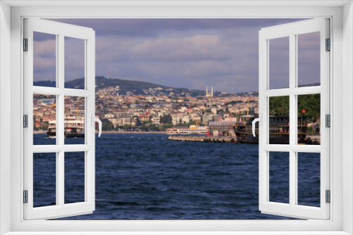 Fototapeta Naklejka Na Ścianę Okno 3D - Cityscape View from the water to buildings in the city of Istanbul 