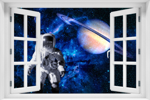 Fototapeta Naklejka Na Ścianę Okno 3D - Astronaut Saturn Planet Galaxy