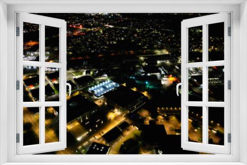 Fototapeta Naklejka Na Ścianę Okno 3D - Aerial View of Illuminated Watford City Centre During Night, England UK.