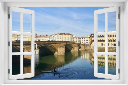 View of the river Arno and buildings from the embankment in Florence. High quality photo