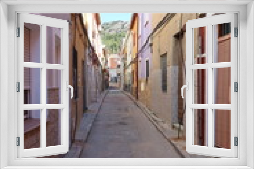 Fototapeta Naklejka Na Ścianę Okno 3D - Villena, Alicante, Spain, March 5, 2024: A street in the old neighborhood of Villena, Alicante, Spain