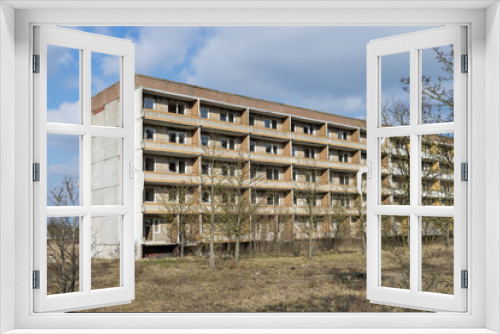 Fototapeta Naklejka Na Ścianę Okno 3D - Vacant, abandoned apartment block in Stendal, Saxony-Anhalt, Germany