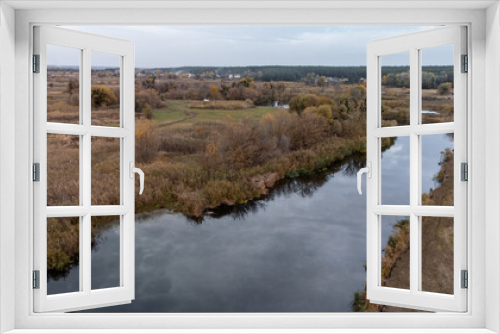 Fototapeta Naklejka Na Ścianę Okno 3D - Aerial river scenery in autumn countryside