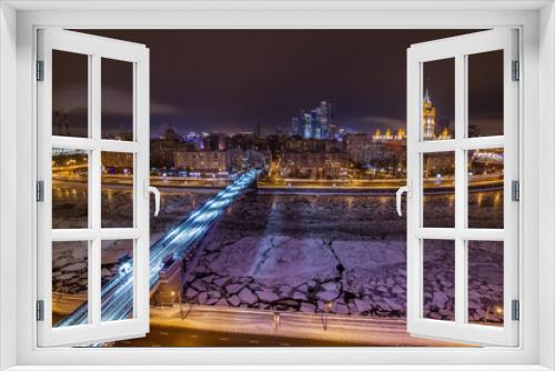 Fototapeta Naklejka Na Ścianę Okno 3D - Smolensky Metro Bridge and river at winter night in Moscow, Russia, long exposure