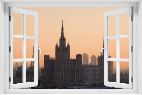 Fototapeta Naklejka Na Ścianę Okno 3D - Residential house on Kudrinskaya Square and Ukraine hotel (Stalin skyscrapers) at morning in Moscow