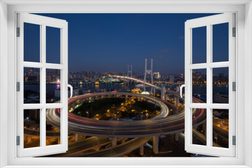 Fototapeta Naklejka Na Ścianę Okno 3D - Huangpu Bridge and large transport interchange with illumination at dark night