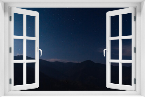 Fototapeta Naklejka Na Ścianę Okno 3D - Montañas de la cordillera nocturna - Pijao, Quindío 