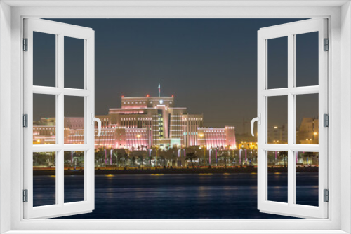 Fototapeta Naklejka Na Ścianę Okno 3D - Doha skyline with Ministry of Interior night timelapse. Doha, Qatar, Middle East