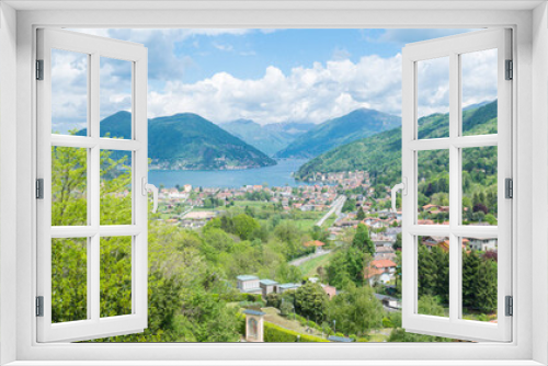 Fototapeta Naklejka Na Ścianę Okno 3D - Lugano lake and the towns of Besano and Porto Ceresio. In the background Vico Morcote and Campione d'Italia towns. Besano is the starting point for the Italian side of Mount San Giorgio, UNESCO Site
