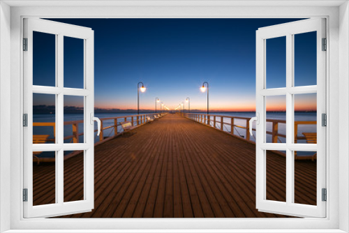 Fototapeta Naklejka Na Ścianę Okno 3D - Beautiful colorful Sunrise on the pier at the seaside