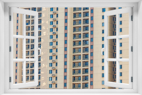 Fototapeta Naklejka Na Ścianę Okno 3D - The appearance of urban residential buildings with regular window close-up