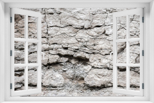 Fototapeta Naklejka Na Ścianę Okno 3D - Cracked rough white rock wall, natural stone background texture