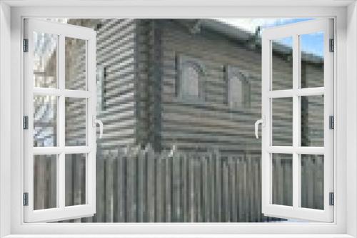 Fototapeta Naklejka Na Ścianę Okno 3D - Wooden boards, fence, wooden house, natural materials, logs, beams, gates, winter in the village