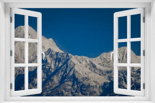 Fototapeta Naklejka Na Ścianę Okno 3D - Beautiful snow-capped mountains of Tibet against the blue sky