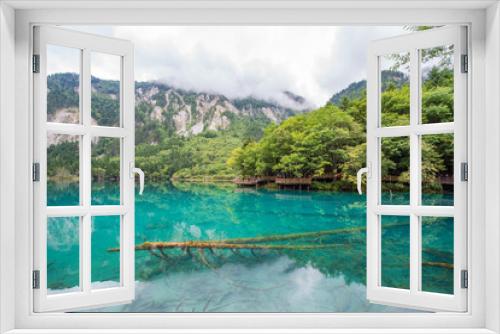 Fototapeta Naklejka Na Ścianę Okno 3D - Beautiful view of the blue lake of Wolong Sea in Jiuzhaigou, Sichuan, China