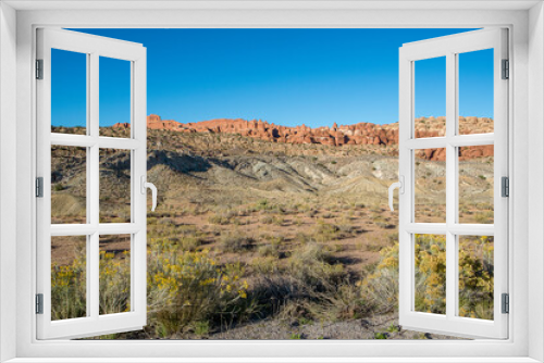 Fototapeta Naklejka Na Ścianę Okno 3D - Sunny day in Arches National Park near Moab in Utah. The park contains more than 2000 natural sandstone arches.