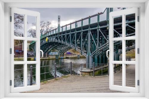 Fototapeta Naklejka Na Ścianę Okno 3D - Berlin, Germany, March 6, 2024: steel bridge across a canal in Tiergarten park