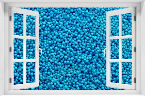 Fototapeta Naklejka Na Ścianę Okno 3D - small blue beads close-up background. easter baking decor