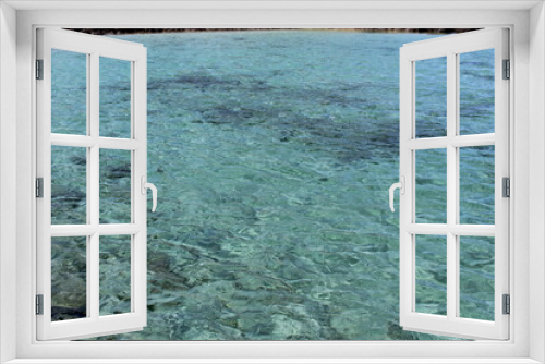 Fototapeta Naklejka Na Ścianę Okno 3D - Clear and transparent blue sea water in a lagoon 