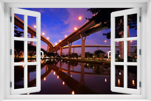 Fototapeta Naklejka Na Ścianę Okno 3D - Bhumibol Bridge with skyline reflection at twilight in Bangkok