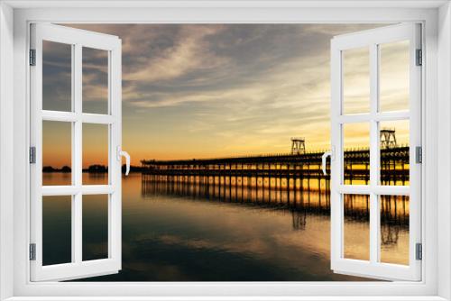 Fototapeta Naklejka Na Ścianę Okno 3D - Sunset at The Rio Tinto Pier (Muelle de Rio Tinto) in Huelva,  Andalusia, Spain