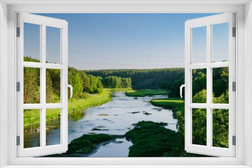 Fototapeta Naklejka Na Ścianę Okno 3D - Tranquil River in Verdant Summer Woodlands
