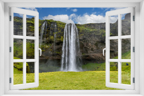 Fototapeta Naklejka Na Ścianę Okno 3D - The magnificent Seljalandsfoss waterfall in Iceland. Location: Seljalandsfoss waterfall, part of the Seljalandsa river, Iceland, Europe