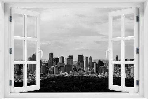 Fototapeta Naklejka Na Ścianę Okno 3D - 高層ビルから東京都内のビル群をモノクロームで撮影