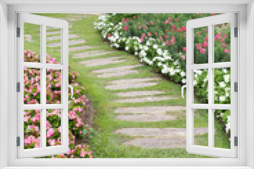 Fototapeta Naklejka Na Ścianę Okno 3D - landscape of floral gardening with pathway and bridge in garden