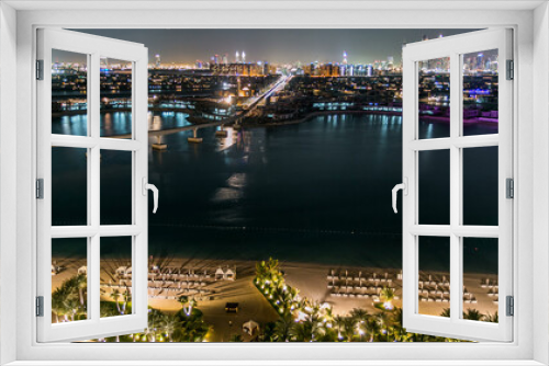 Fototapeta Naklejka Na Ścianę Okno 3D - Jumeirah Palm island skyline night timelapse in Dubai, UAE.