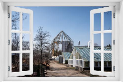 Fototapeta Naklejka Na Ścianę Okno 3D - Greenhouse building under reconstruction, Botanical Garden in the city center