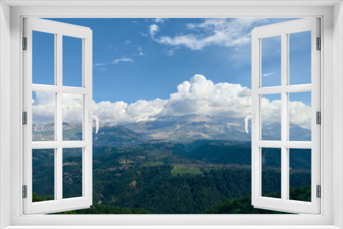 Fototapeta Naklejka Na Ścianę Okno 3D - Expansive view featuring the mountain ranges near Köprülü Canyon in Antalya, under a sky with dramatic clouds.