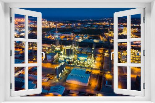 Fototapeta Naklejka Na Ścianę Okno 3D - Night aerial panoramic view of large chemical plant located next to Salou city, Spain