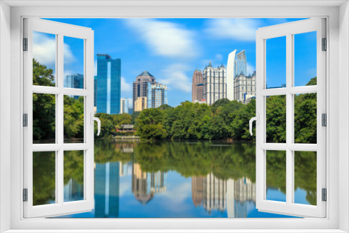 Fototapeta Naklejka Na Ścianę Okno 3D - Skyline and reflections of midtown Atlanta, Georgia