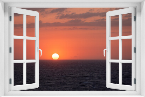 Fototapeta Naklejka Na Ścianę Okno 3D - Beautiful sunset sky over the calm ocean. View from the sailing ship.
