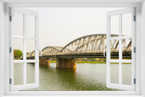 Fototapeta Naklejka Na Ścianę Okno 3D - Truong Tien Bridge Crossing Huong River In Hue City, Vietnam. Truong Tien Bridge Is One Of The Symbols Of Hue City.