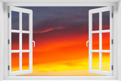 Fototapeta Naklejka Na Ścianę Okno 3D - Fiery Orange Clouds At Sunset.