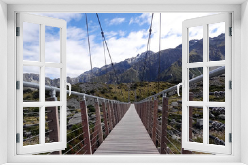 Fototapeta Naklejka Na Ścianę Okno 3D - Suspension Bridge over Glacial River