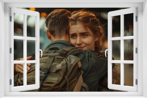 Depressed woman hugging her husband embraces a military man before leaving on war