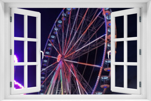 Fototapeta Naklejka Na Ścianę Okno 3D - Ferris wheel at night in an amusement park