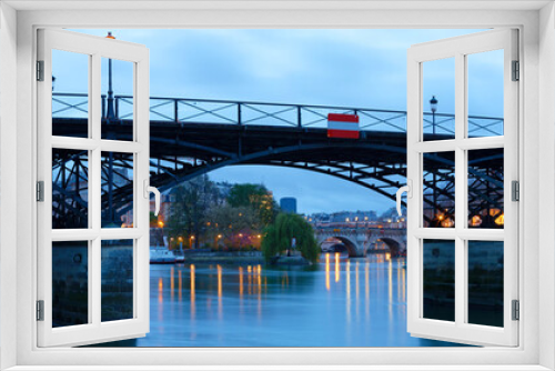 Fototapeta Naklejka Na Ścianę Okno 3D - The panoramic view of Paris, Seine river, Arts bridge in the early morning .