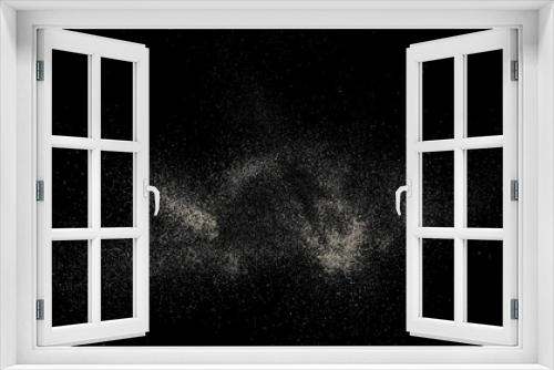 Fototapeta Naklejka Na Ścianę Okno 3D - Sand flying, scattered dust isolated on black background and texture