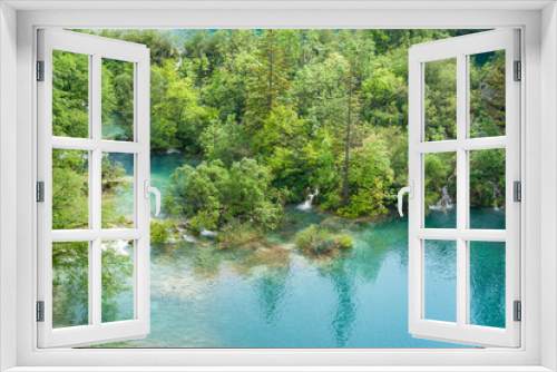 Fototapeta Naklejka Na Ścianę Okno 3D - View of turquoise water of lakes surrounded by luxuriant green forest Croatia